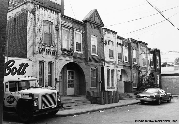 Affordable housing, like these homes off Spadina on Glen Baillie Place, has attracted newcomers to Kensington since its beginnings. - Photo courtesy: Ray McFadden, 1980